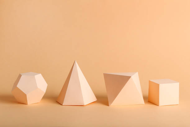 istock Paper geometric figures on beige background 1205693788