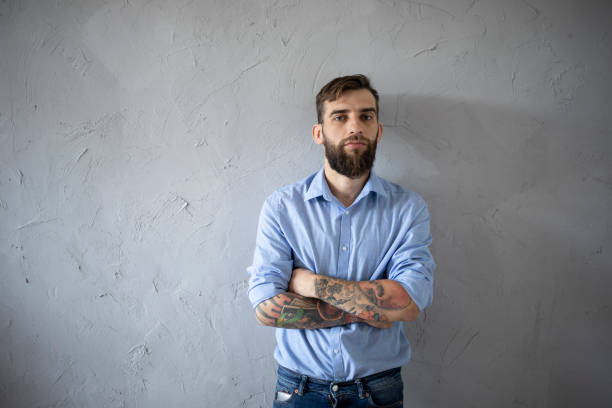 istock Hipster portrait in front of gray background 1205694549