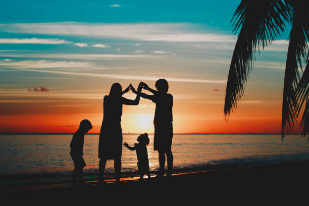 Silhouette Young Family On The Beach Stock Photos, Pictures & Royalty-Free Images - iStock Silhouette Young Family On The Beach Stock Photos, Pictures & Royalty-Free Images - iStock