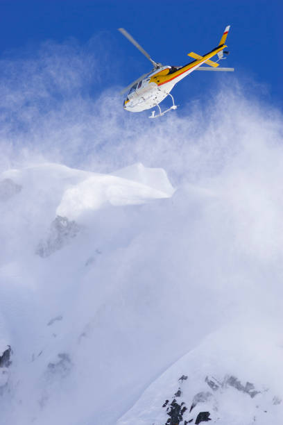 istock Helicopter taking off at the top of a mountain 1205700762