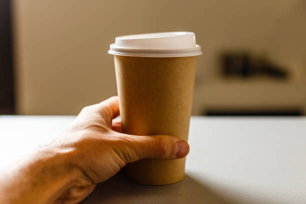 istock Cup of take-out coffee on a background 1205702159
