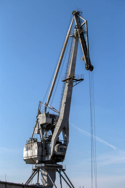 istock Old cargo crane on the Danube bank 1205703910