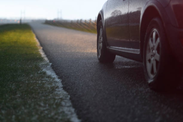 istock Car driving through a hailstorm during a cold winter day 1205712763