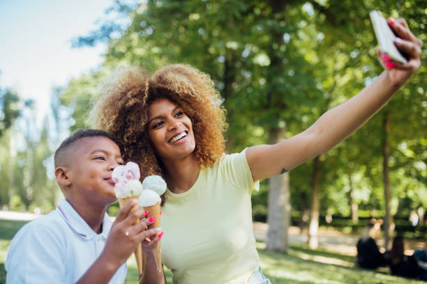 istock Eating ice cream and taking selfies 1205713124