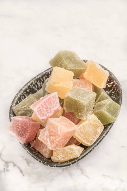 istock colorful Turkish delights in a bowl on a table with copy space 1205717901