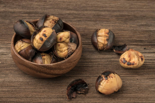 istock roasted chestnuts in a bowl on a wooden table 1205718039