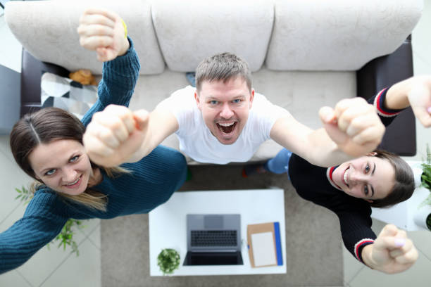 group of young european smiling people or team celebrating successful project finish - ispiration imagens e fotografias de stock