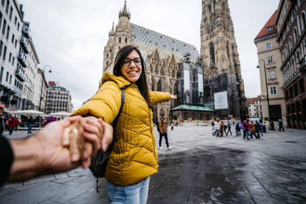 istock Young woman leading her boyfriend 1205721109