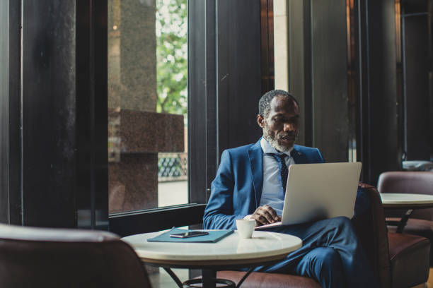 African Businessman Working on his Laptop