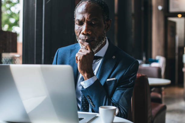 istock African Businessman Working on his Laptop 1205721160