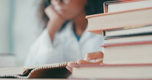 Cropped shot of a young girl doing school work in a mathematics class