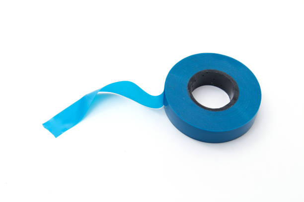 istock blue insulation tape, isolate on a white background. Concept of repair, work with electricity 1205727832
