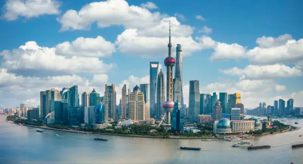 Panorama of the skyline of Shanghai urban and huangpu river, China, on a sunny day