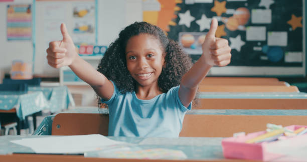 あなたはスターの学生です! - thumbs up child success winning ストックフォトと画像