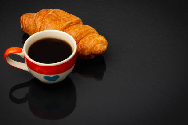 istock Heart pattern coffee cup In the cup there is black coffee 1205731250
