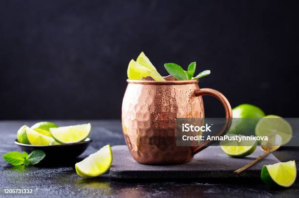 Moscow Mule Cocktail With Ginger Beer Vodka Lime And Mint Dark Background Close Up Stock Photo - Download Image Now