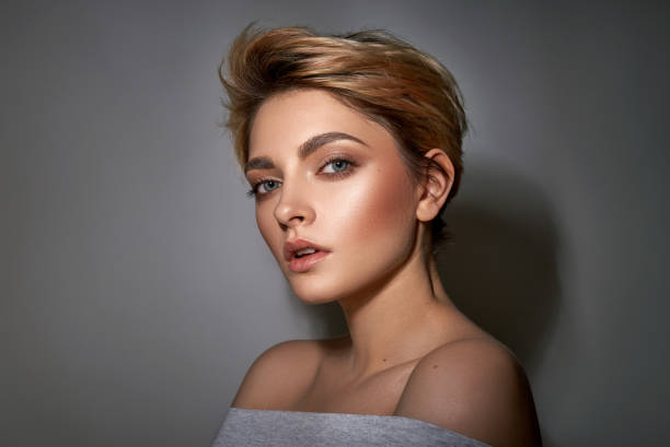 Portrait of blonde woman with short hair stock photo