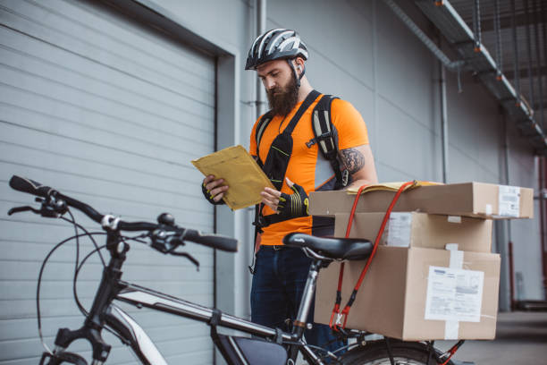 istock Delivery person on right address 1205734654