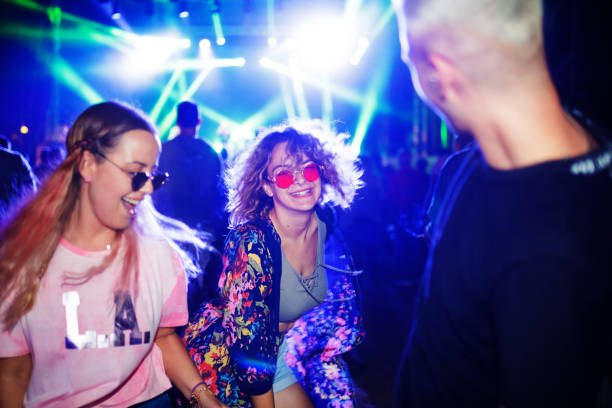 istock Dancing at music festival 1205738602
