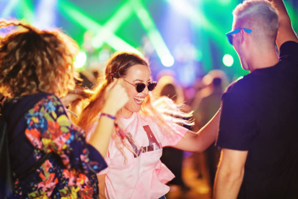 istock Dancing at music festival 1205738679