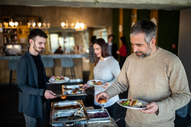 istock Colleagues enjoying brunch after successful business meeting 1205741296