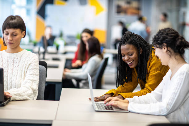 istock Multi-ethnic coworkers working as a team at modern office 1205741536