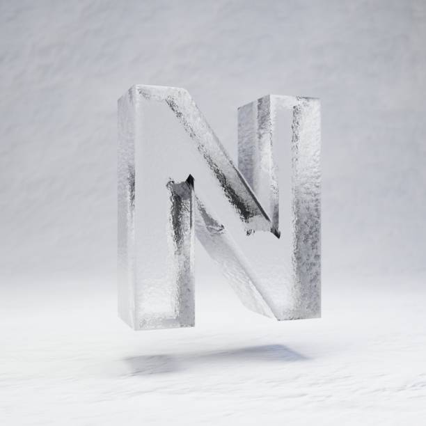 istock Ice letter N uppercase on snow background. 1205743293