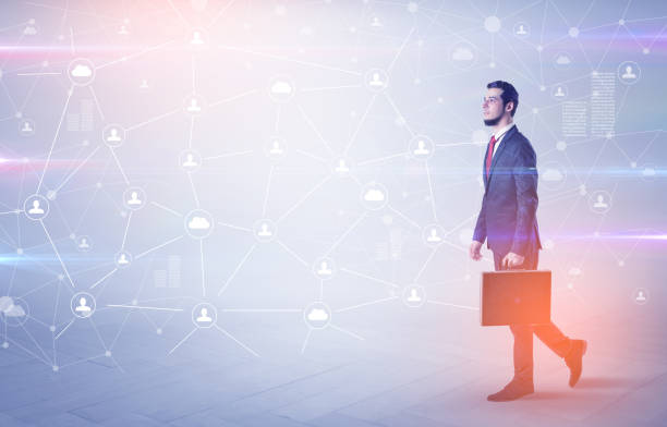 istock Man walking with online community wallpaper 1205745264