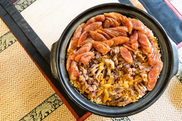Claypot lap mei fan, or mixed wax meat rice, Chinese New Year delicacy among the ethnic Chinese.