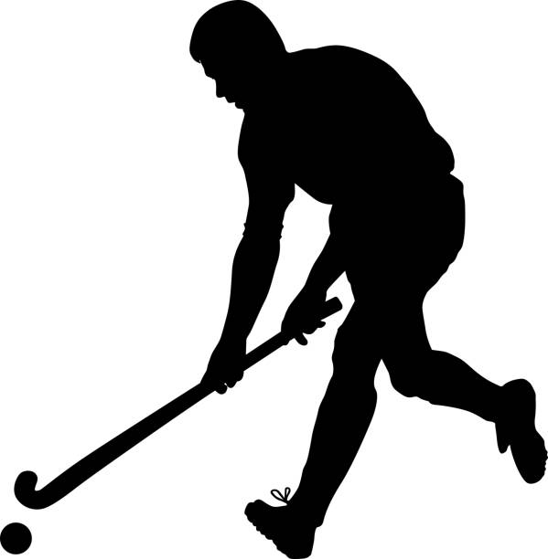istock Vector silhouette of field hockey player with a hockey stick 1205758906