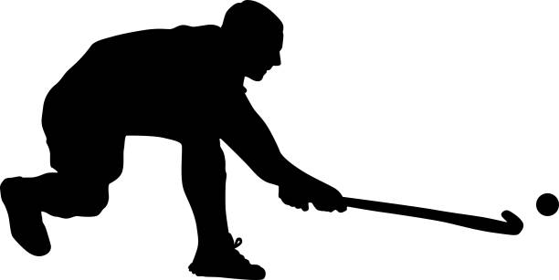 istock Vector silhouette of field hockey player with a hockey stick 1205759096