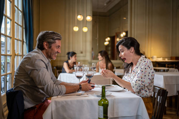 istock Romantic marriage proposal leaves excited woman without words 1205759657