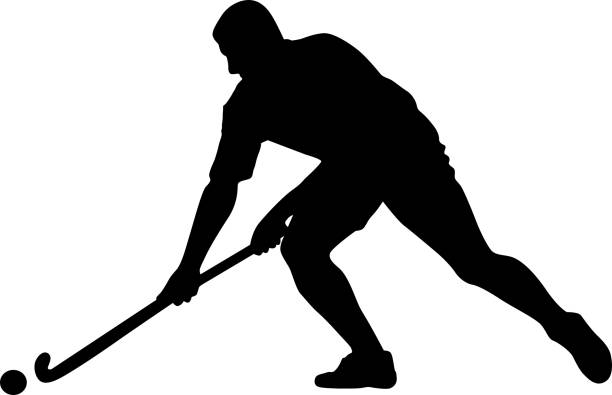 Vector silhouette of field hockey player with a hockey stick vector art illustration