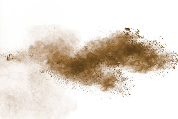 istock Abstract deep brown dust explosion on white background.Freeze motion of brown dust splash. 1205761156