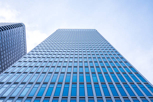 istock Architecture details Modern Building Glass facade Business background 1205761987