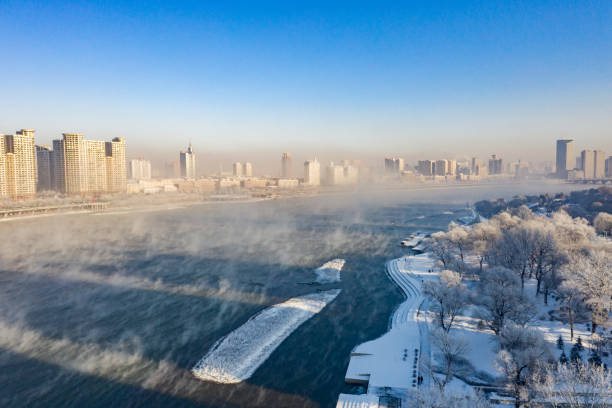 istock Winter city along the river 1205762532