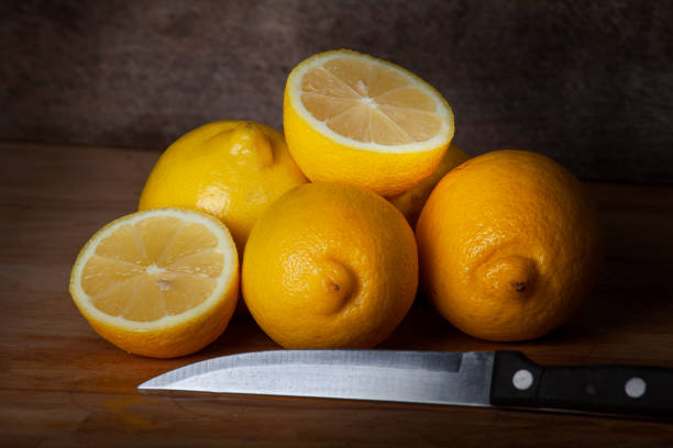 istock lemon stil life on wooden desk 1205763379