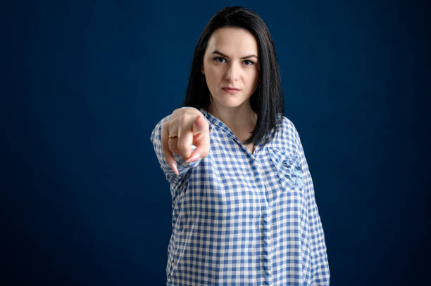 istock Young woman pointing his finger 1205765373