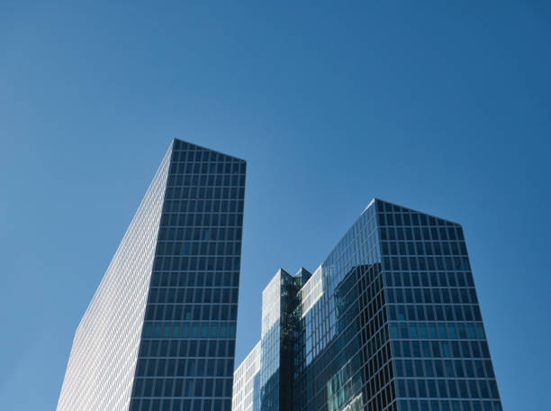 istock Two high-rise buildings with glass facade 1205765526