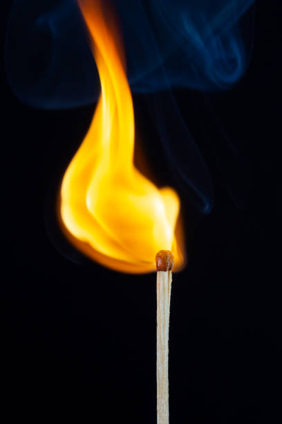 istock Flame and smoke on the matchsticks over black background 1205769965