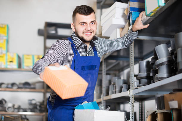 istock Professional man worker looking through sanitary drain pipes 1205770042