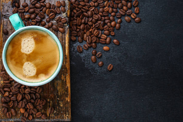 istock coffee drink and coffee grain (beverage, delicious hot drink). top view. copy space 1205775756
