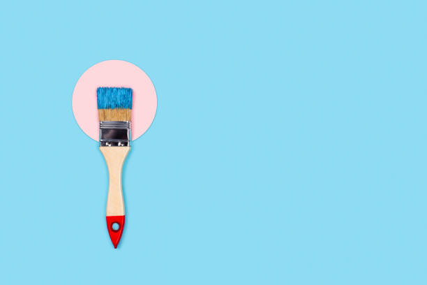 istock Blue background with paint brush and circle. 1205776752