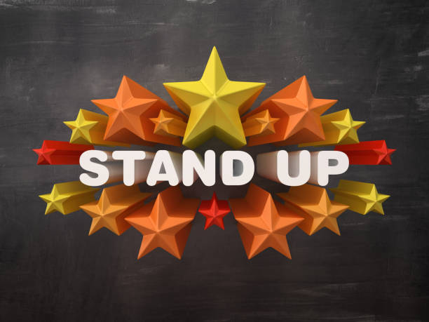 istock Colorful Stars with STAND UP Word on Chalkboard Background - 3D Rendering 1205777552