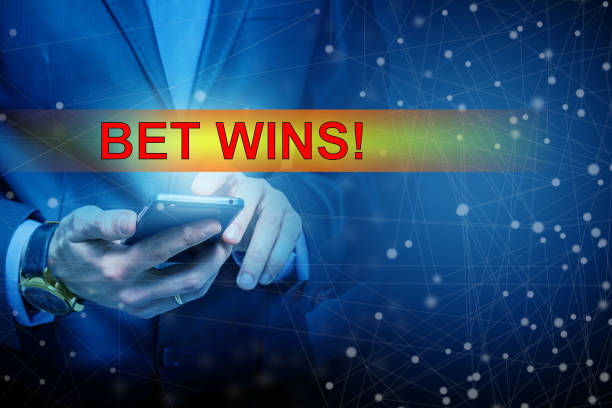 istock Euphoric happy businessman wear suit celebrate mobile win, 1205778473