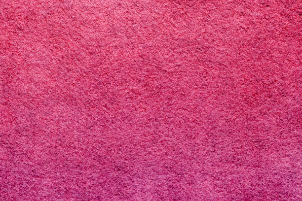 istock Red felt soft rough textile material background texture close up.Colorful felt texture for background with copy space. Felt fabric sheet 1205780477