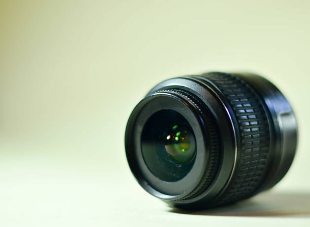 istock Black lens for a camera on a white background 1205782357
