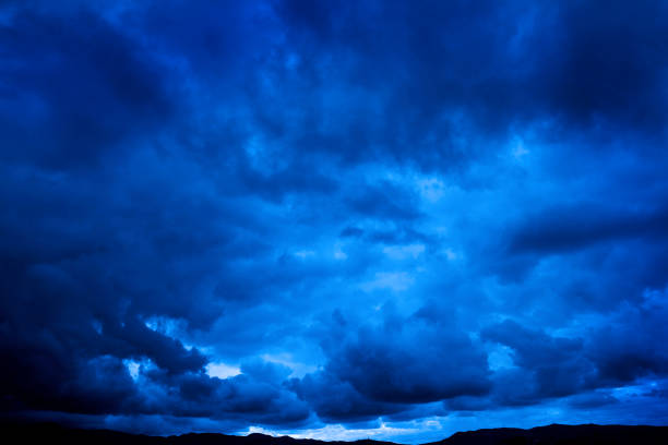 Dark stormy rain storm clouds fierce temptest