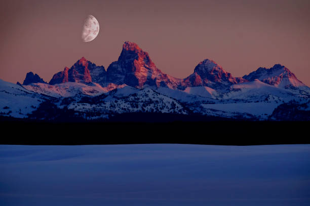 istock Sunset light with alpen glow on Tetons Tetons mountains rugged 1205782507