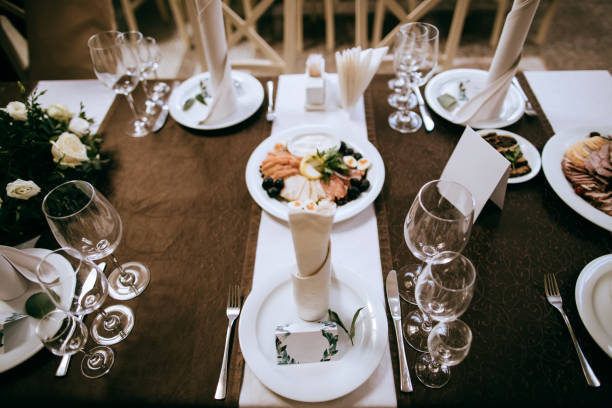 istock Elegant table set for dinner with food.  Catering service 1205785278